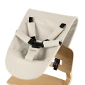 LEANDER Newborn Seat Cappuccino, widok zamontowany na krzesełku